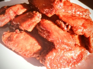 Porção de tulipa frita ao molho agridoce picante
