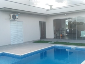 Foto de Joel Pereira Silva Construtor em Ninho Verde I Eco Residence, SP por Solutudo