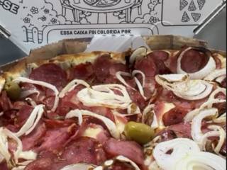 Bateu a vontade de pizza? Peça na Dom Caetano Delivery!