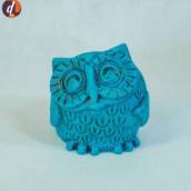 Coruja azul turquesa