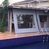 Toldo cortina em lona vedasol com visor transparente