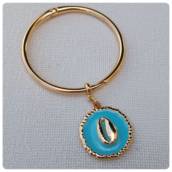 Bracelete com pingente azul resinado em Bauru