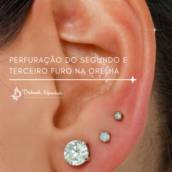 Perfuração do segundo e terceiro furo na orelha