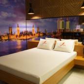 Suíte Temática Londres – Elegância Clássica e Tecnologia em Cacoal