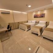 Suíte Quadruplo Luxo Aracaju em Aracaju, SE por Jatobá Praia Hotel