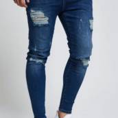 Calça Jeans Masculina Super Skinny Estonada Destroyed a Laser para Visual Ousado