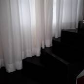 Cortinas que Acompanham os Degraus da Escada 