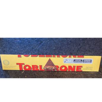 Comprar o produto de CHOCOLATE TOBLERONE  em Chocolate pela empresa Empório Primare Bebidas e Eventos - Loja 02 em Mineiros, GO por Solutudo