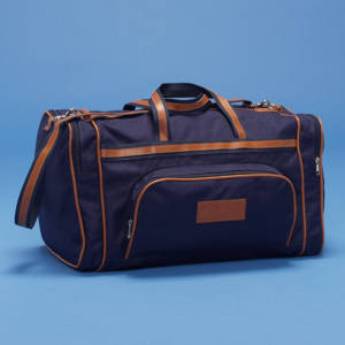 Comprar o produto de Bolsa de 48x28x28 em nylon 600, com detalhes em couro sintético, com bolso frontal e laterais, alça de mão e de ombro, fechamento zíper em Sacos e Mochilas em São Paulo, SP por Solutudo