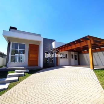 Comprar o produto de Imóveis com Suítes​ à venda de em Santa Cruz do Sul em Venda - Casas em Santa Cruz do Sul, RS por Solutudo