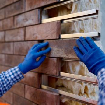 Comprar o produto de Assentamento revestimento de parede em Construtoras em Duque de Caxias, RJ por Solutudo