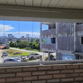 Comprar o produto de Envidraçamento de sacada em Vidraçarias em Palhoça, SC por Solutudo