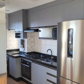 Comprar o produto de Cozinha Planejada Sob Medida para Você - Funcionalidade e Estilo em Guarulhos em Móveis Planejados - Marcenarias em Guarulhos, SP por Solutudo Comprar o produto de Cozinha Planejada Sob Medida para Você - Funcionalidade e Estilo em Guarulhos em Móveis Planejados - Marcenarias em Guarulhos, SP por Solutudo