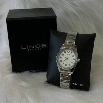 Comprar o produto de Relógio Lince Feminino Prata - LRMJ099L em Joias e Relógios pela empresa Ótica Conceito em Foz do Iguaçu, PR por Solutudo