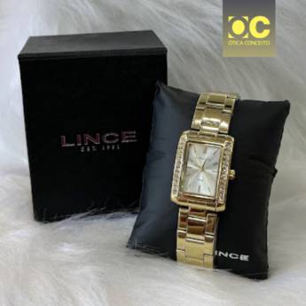Comprar o produto de Relógio Lince Urban Feminino Dourado - LQG4827L26 em Joias e Relógios pela empresa Ótica Conceito em Foz do Iguaçu, PR por Solutudo