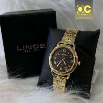 Comprar o produto de Relógio Feminino Dress Dourado - LRGM028L36 em Joias e Relógios pela empresa Ótica Conceito em Foz do Iguaçu, PR por Solutudo