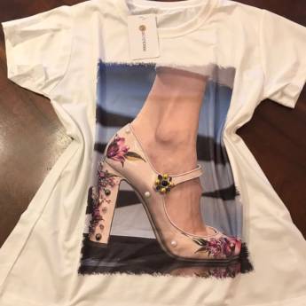 Comprar o produto de T-shirt personalizada salto nude em Roupas e Acessórios pela empresa Loja Ego - Roupas e Acessórios Femininos Multimarcas em Botucatu, SP por Solutudo