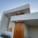 Porta Ripada - Madeira Maciça com Bandeira em Ninho Verde II Eco Residence, SP por Portales Portas e Janelas