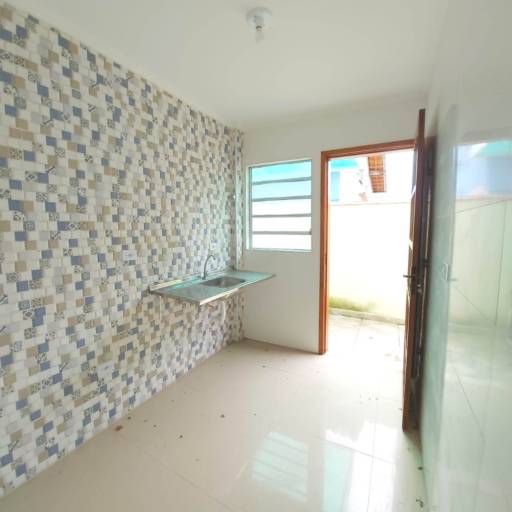 Sobrado com 2 dormitórios à venda, 63 m² por R$ 210.000 - Maracanã - Praia Grande/SP. em Praia Grande, SP por SPINOLA Consultoria Imobiliária