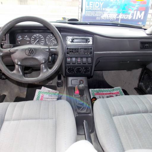 SANTANA 1.8 i - 1996 - PRETO - 4 PORTAS + DIR HIDR + VIDR ELETR + TRAVAS ELETR por Top Car Veículos