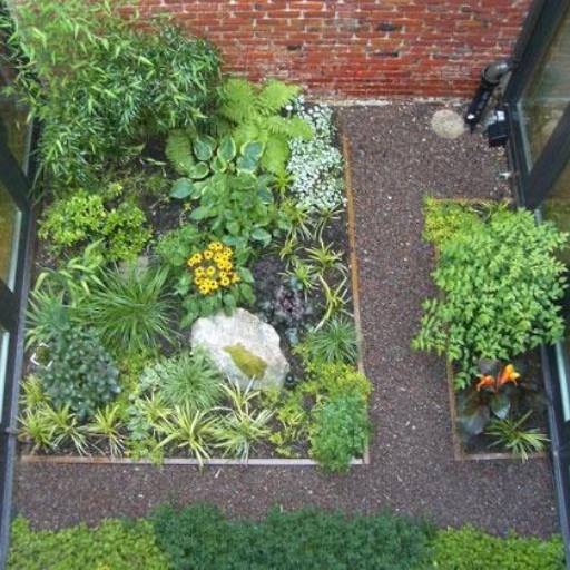 Jardim de inverno  por Flora Camila Paisagismo