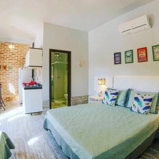 Studio Lagoa com Varanda Frente para Piscina e Jardins por Studios das Lagoas Boutique Studio Lagoa com Varanda Frente para Piscina e Jardins por Studios das Lagoas Boutique