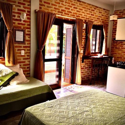 Studio Lagoa com Varanda Frente para Piscina e Jardins por Studios das Lagoas Boutique Studio Lagoa com Varanda Frente para Piscina e Jardins por Studios das Lagoas Boutique