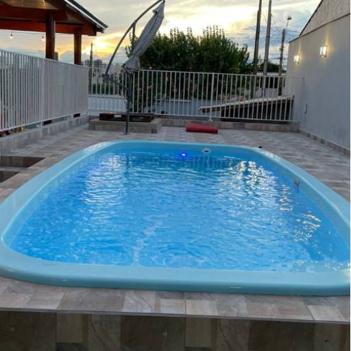 Clubinho com piscina aquecida em Araçatuba por Área de Lazer Pôr do Sol