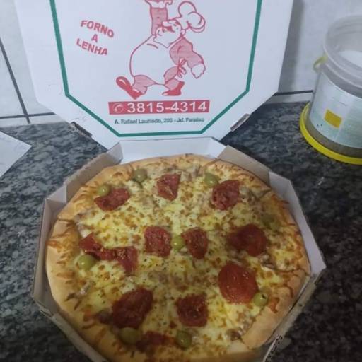Pizza de Forno á Lenha por Pizzaria Paraíso