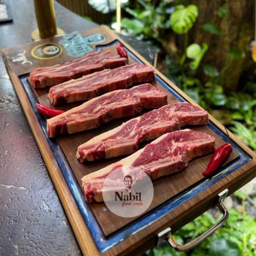 Costela Em Tiras / 3 Ossos por Fino Corte Restaurante e Açougue