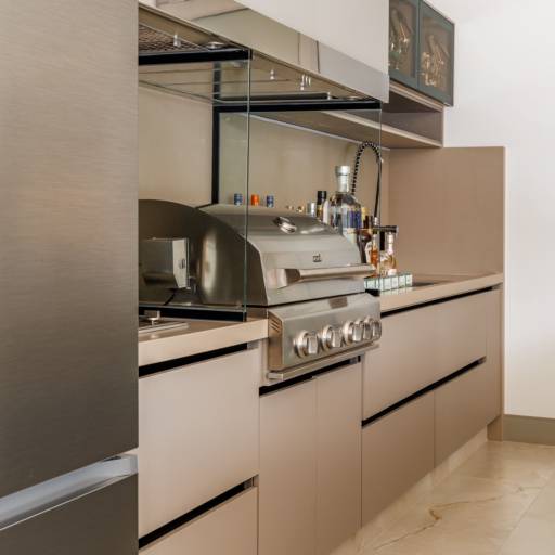 Cozinhas e Espaços Gourmet no Ninho Verde II por THRE3 - Estúdio de Design