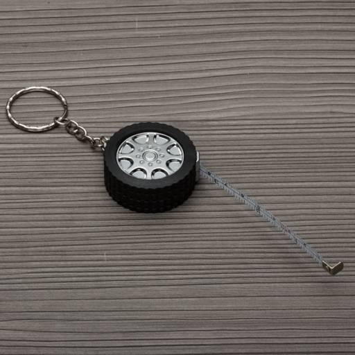 10415-BRI Chaveiro Plástico Trena 1 Metro em São José do Rio Preto, SP por Public Gráfica e Brindes