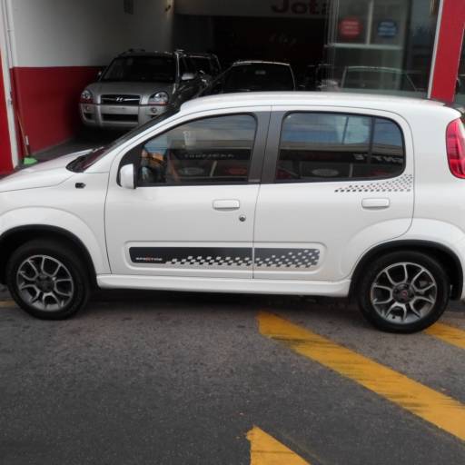 UNO EVO  SPORTING 1.4 FLEX COMPLETO ANO 2013 por Jota Car Veículos 