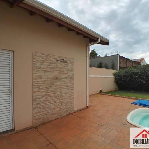 CASA PARA VENDA NO CONDOMÍNIO FLAMBOYANT EM JAÚ - SP em Jaú, SP por  Imobiliária Perlati