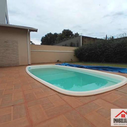 CASA PARA VENDA NO CONDOMÍNIO FLAMBOYANT EM JAÚ - SP em Jaú, SP por  Imobiliária Perlati