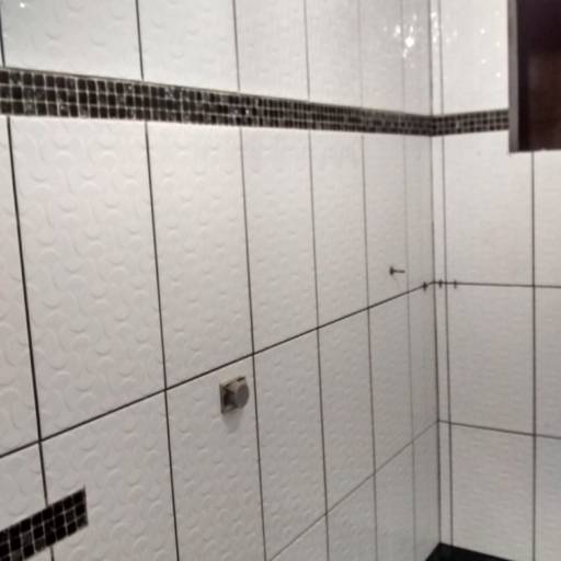 Pisos e Porcelanato  por Ademar Construções