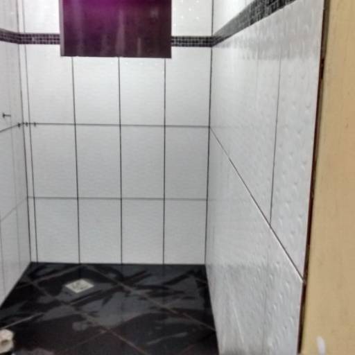 Pisos e Porcelanato  por Ademar Construções